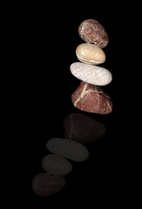 Close-up of illuminated object over black background