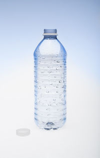 Close-up of water bottle against white background