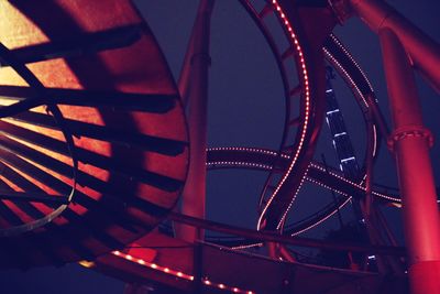 Low angle view of illuminated ferris wheel