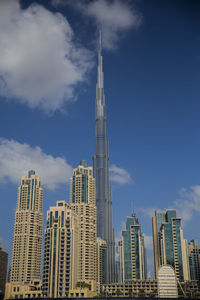 Low angle view of skyscrapers against sky