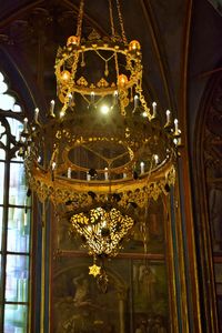 Low angle view of illuminated chandelier