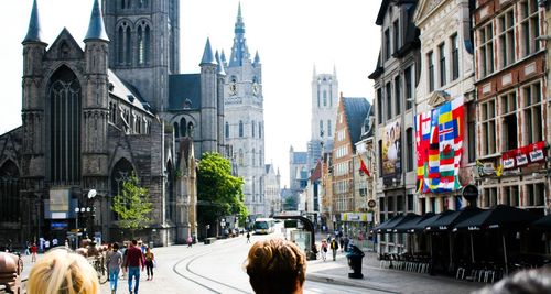 People walking on street in city