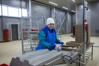 Portrait of man working in factory