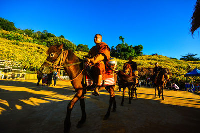 Man riding horse