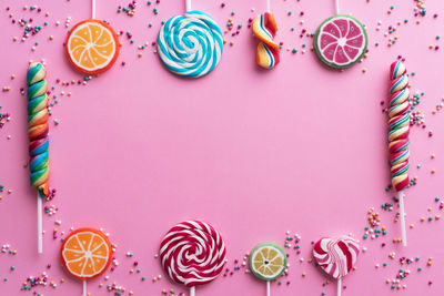 High angle view of multi colored candies on table