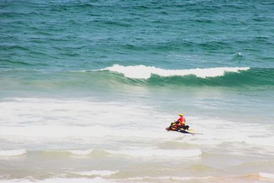 Man surfing on beach