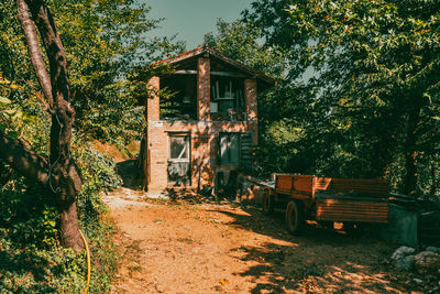 Abandoned farm and old rusty tractor