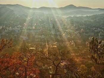 High angle view of trees and mountains against sky