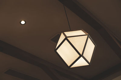 Low angle view of illuminated pendant light