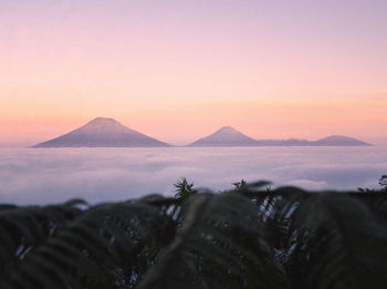 Scenic view of mountains against sky during sunset