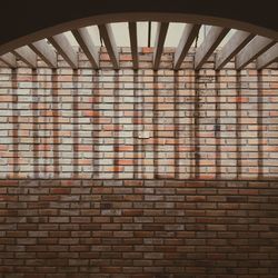 Low angle view of brick wall in building