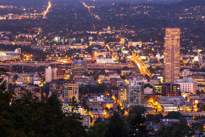 High angle view of illuminated buildings at night