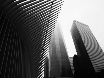 Low angle view of skyscrapers against sky