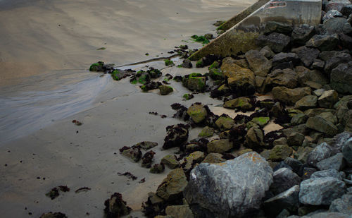 High angle view of stones on beach