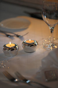 Close-up of wineglasses on table