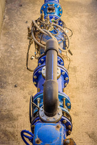 Close-up of metal chain against wall