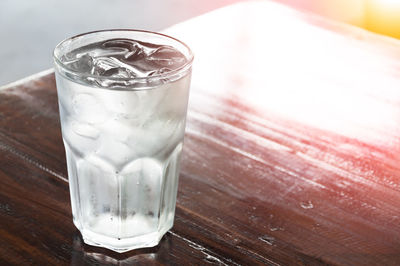 Close-up of ice glass on table