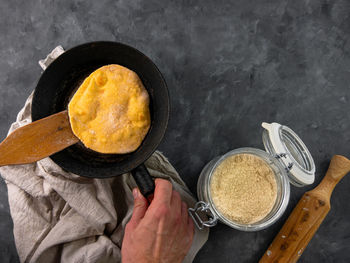 High angle view of person preparing food