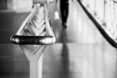 Close-up of metal railing on floor