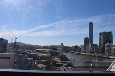 View of city against cloudy sky