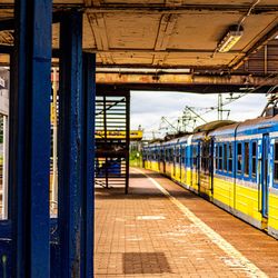 Train or metro at railroad station platform