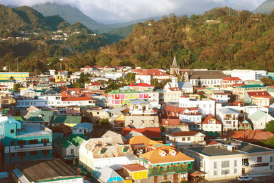 High angle view of townscape against mountains