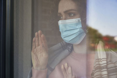 Portrait of woman wearing mask