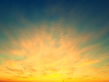 Low angle view of dramatic sky during sunset