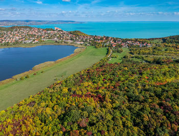 High angle view of plants and sea against sky