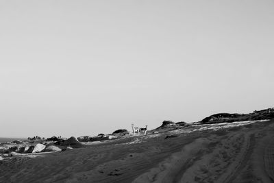 Scenic view of desert against clear sky