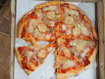 High angle view of pizza on table