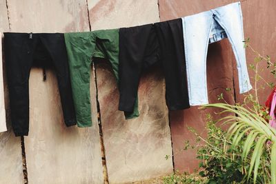 Low section of clothes drying on wood