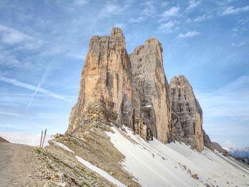 Spring on trail around tre cime di lavaredo massive. the famous mountains in dolomites. very popular