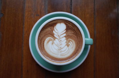 Directly above view of coffee served on table