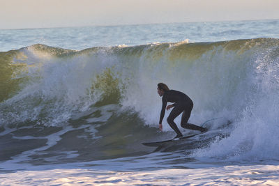 Man surfing in sea