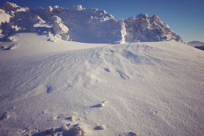 Scenic view of snow landscape against sky