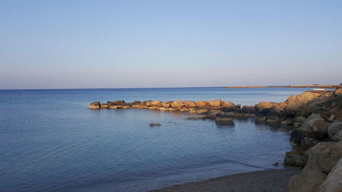 Scenic view of sea against clear sky