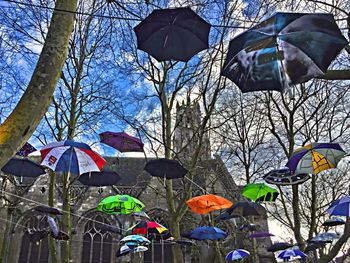 Low angle view of street light against sky
