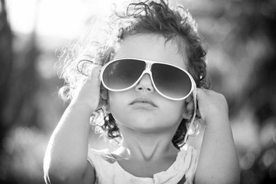 Portrait of cute girl wearing sunglasses