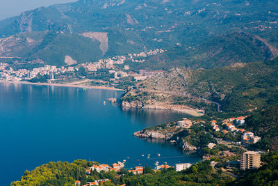 High angle view of townscape by sea