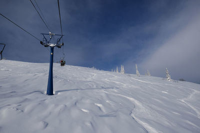 Sunny winter morning in the mountains of sheregesh on the ski track