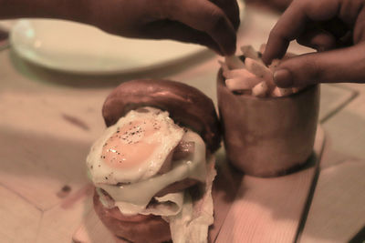 Close-up of hand holding ice cream