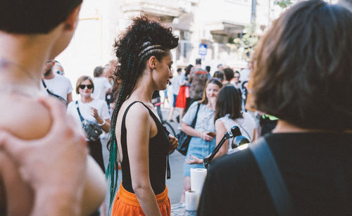 Group of people dancing in city