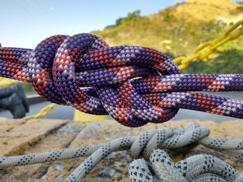 Close-up of ropes tied up outdoors