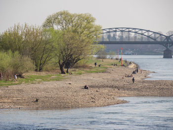 View of bridge over river against clear sky