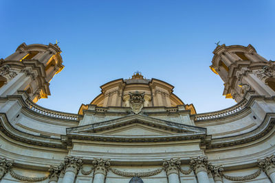 Low angle view of temple against clear blue sky