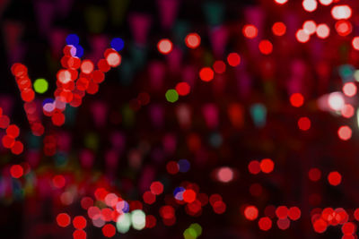 Defocused image of illuminated lights at night