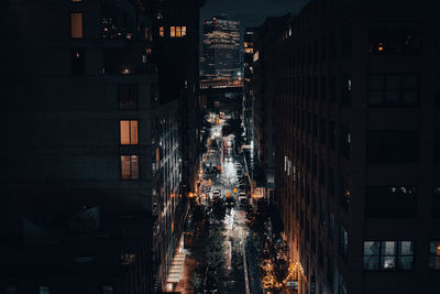 Illuminated buildings in city at night