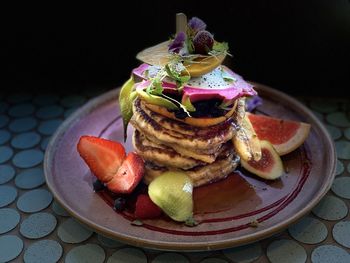 Close-up of dessert served in plate on table