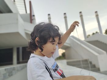 Portrait of boy looking at camera